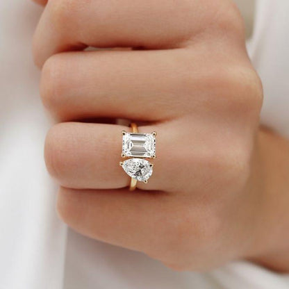 emerald cut and pear cut engagement ring